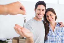 Couple receiving the keys to their Cedar Park tx rental home